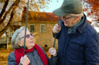 Two older people talking