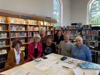 Group of friends in the library